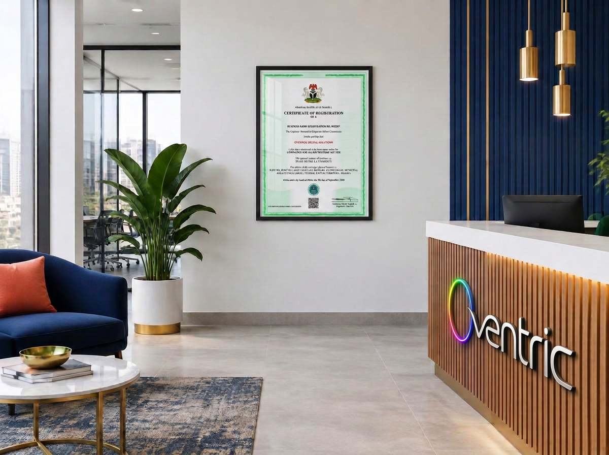 Oventric office reception with its dimensional desk logo and framed CAC registration certificate
